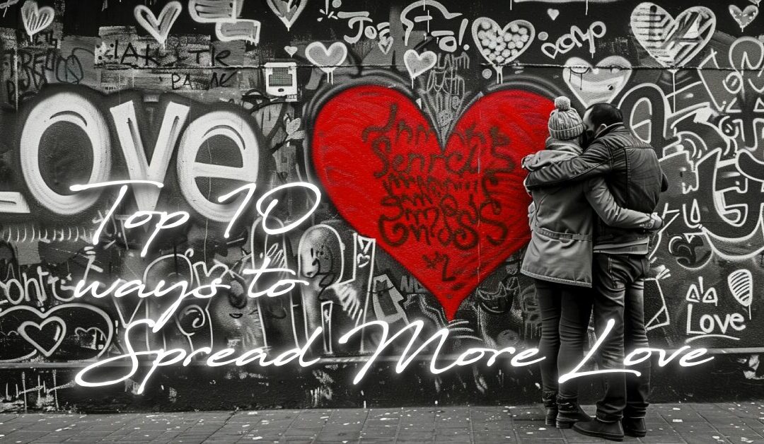 Two People Standing in front of a Love Mural hugging